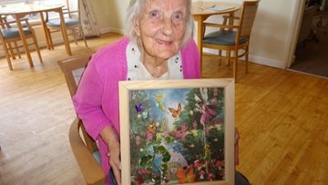 Resident Peggy gets creative at Mossley care home